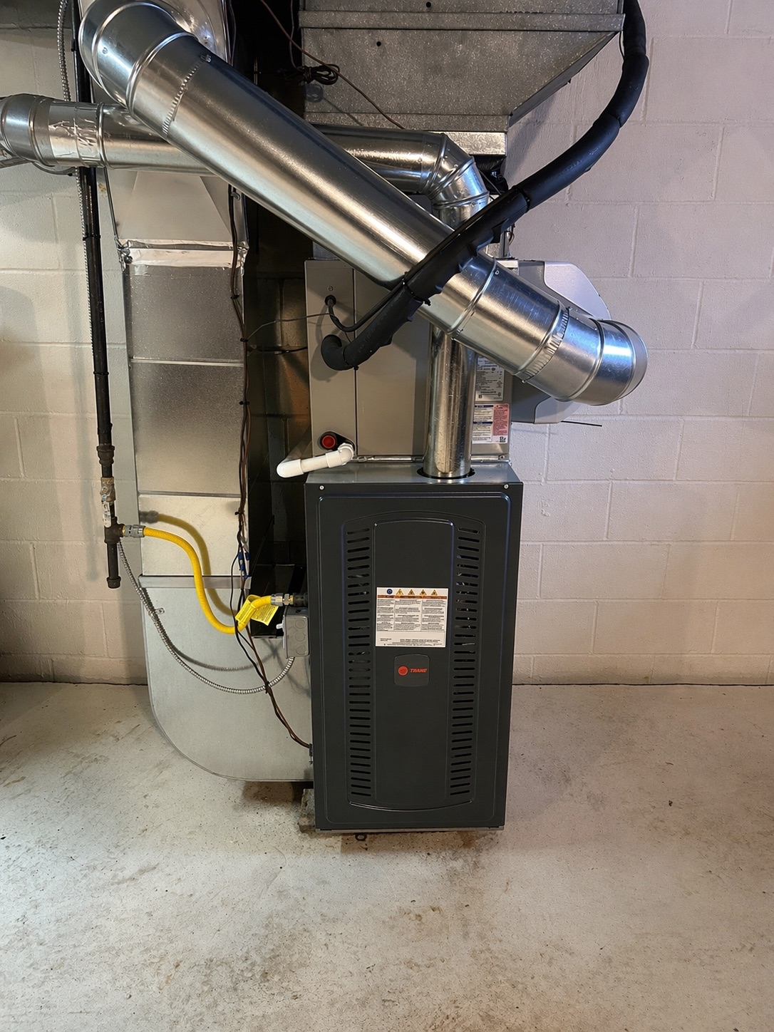 Basement furnace and ductwork installation by C&S Heating & Cooling.