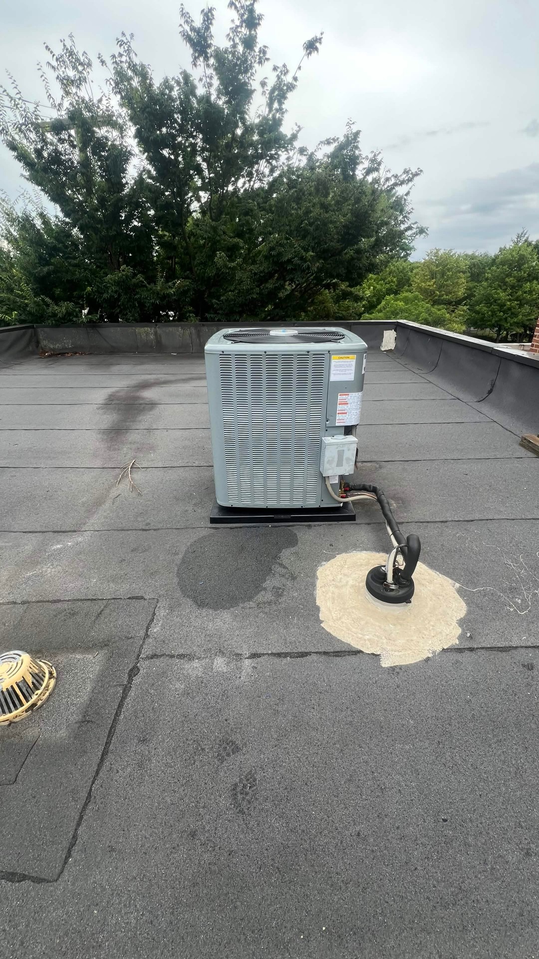Rooftop HVAC unit with drain line work completed by C&S Heating & Cooling.